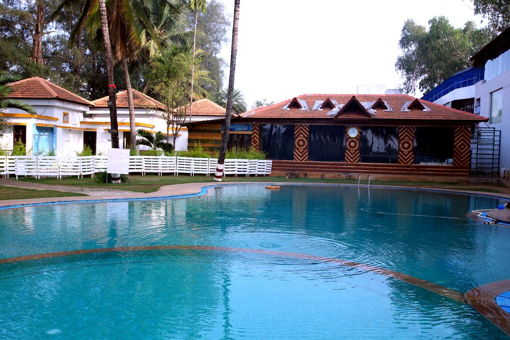 Outdoor swimming pool at The Ashhok Hassan